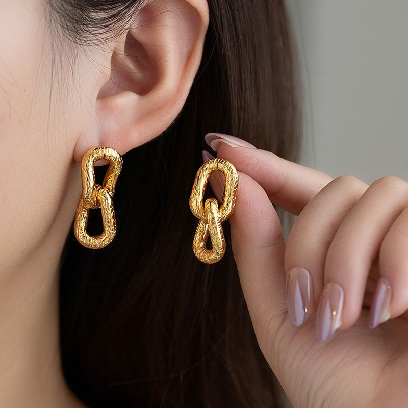 Серьги гвоздики титановая сталь напыление золотом 1J12521CJJ