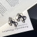 Кольцо с тёмным крестом и цирконом CJZ46408