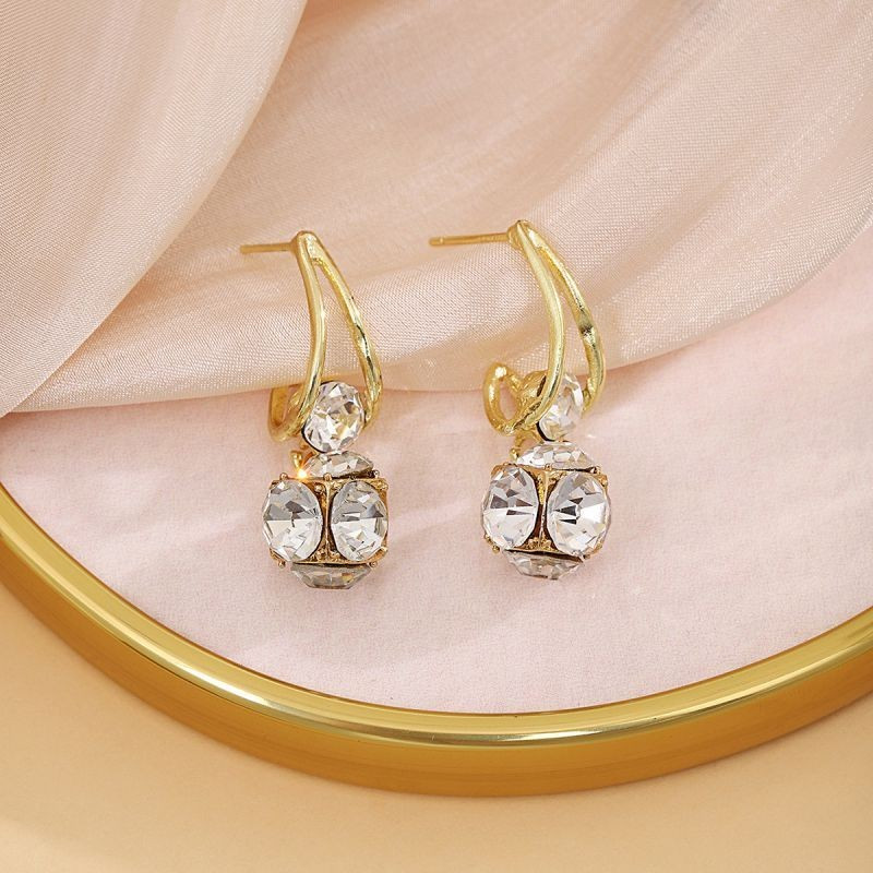 Висячие серьги с кристальными сферами в золотистой оправе CJG33154 Висячие серьги с кристальными сферами в золотистой оправе CJG33154