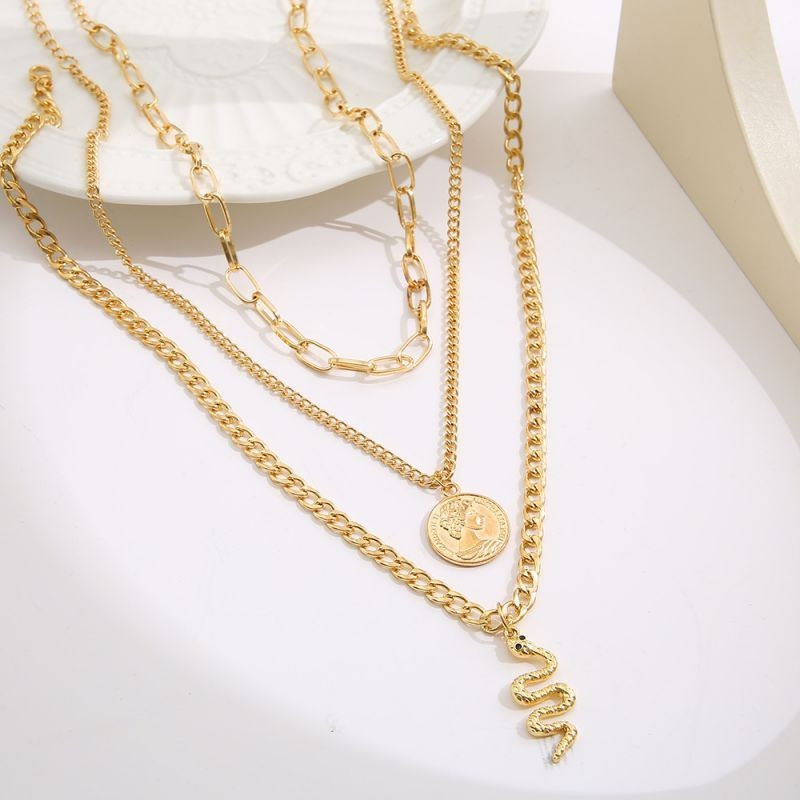 Трехслойное колье с античной монетой и змеей CJG33642