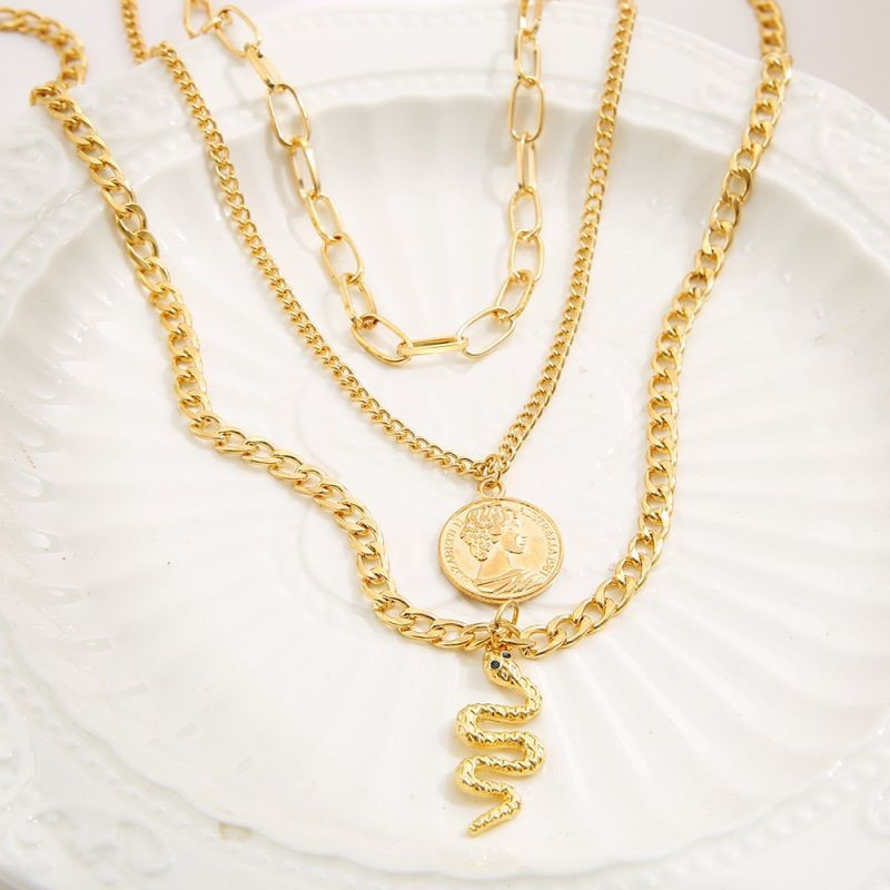 Трехслойное колье с античной монетой и змеей CJG33642