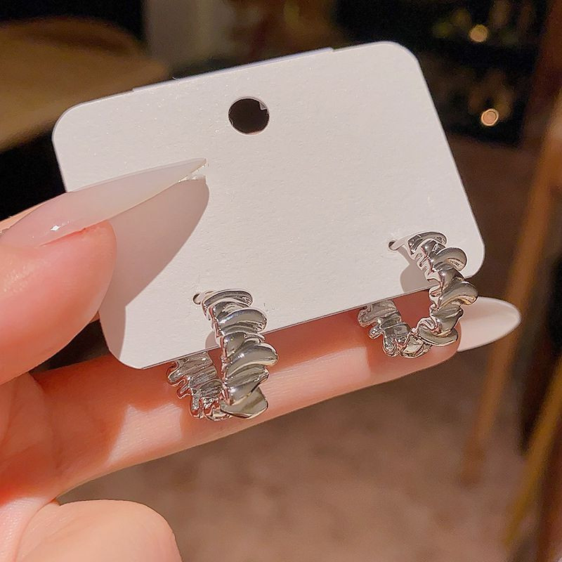 Серебристые серьги с сердцем из циркона и кистями CJX87501