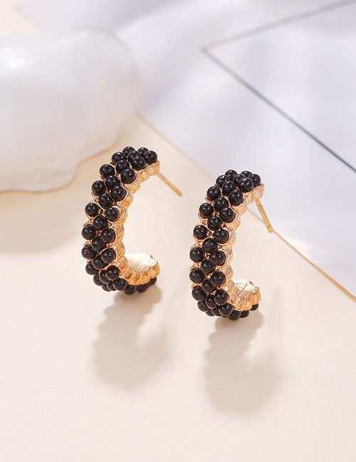 Серьги-кольца с фактурным черно-золотым плетением Z28898 Серьги-кольца с фактурным черно-золотым плетением Z28898