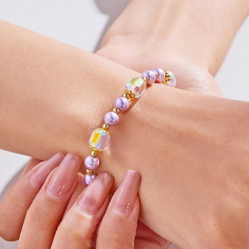 Браслет из жемчужных и сиреневых бусин CJT11409 Браслет из жемчужных и сиреневых бусин CJT11409