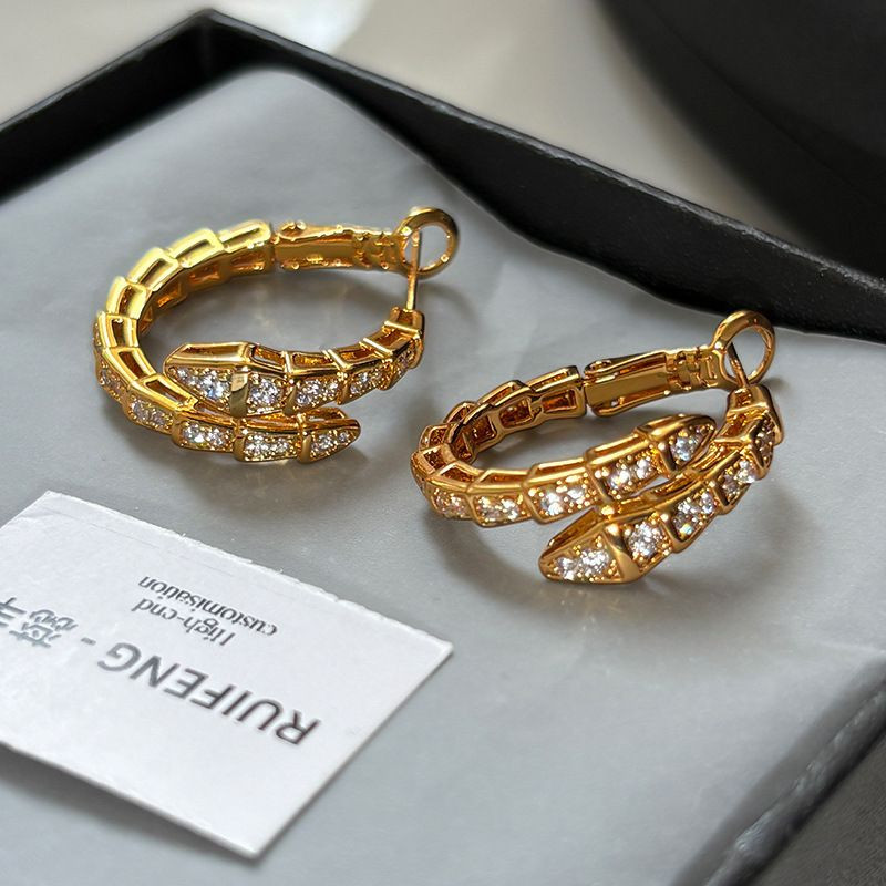 Серьги медь с напылением золотом и фианитами змея 1J11965CJJ