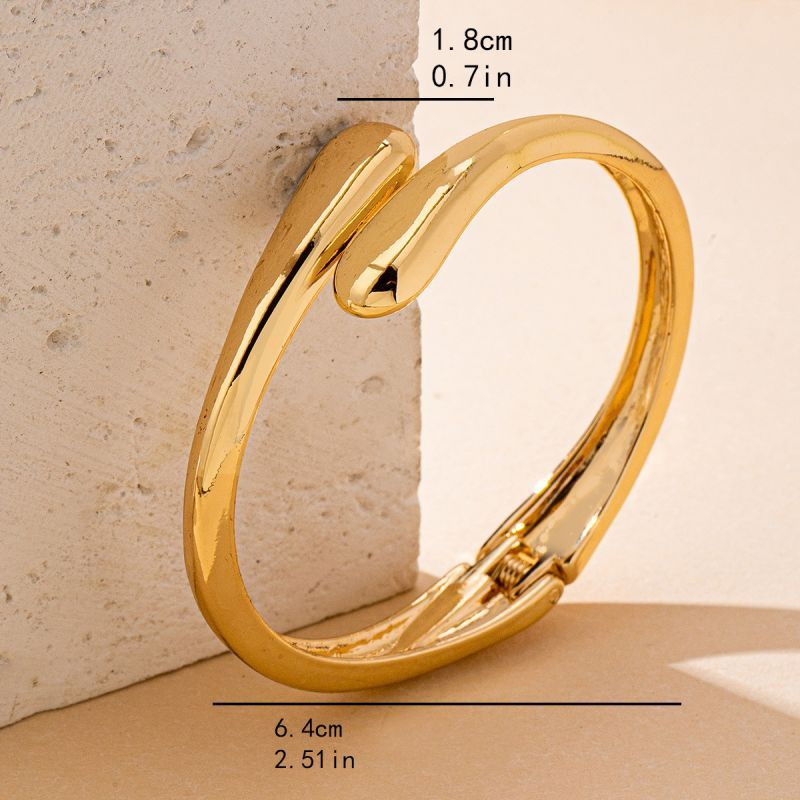 Браслет жесткий разомкнутый с каплевидными наконечниками CJQ22073