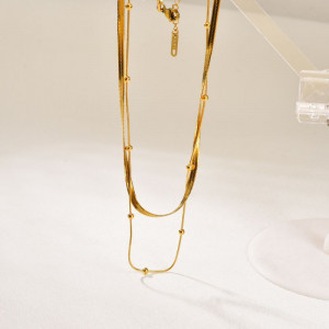 Золотистое двухслойное колье из тонких цепей с жемчужиной CJP75744 Золотистое двухслойное колье из тонких цепей с жемчужиной CJP75744