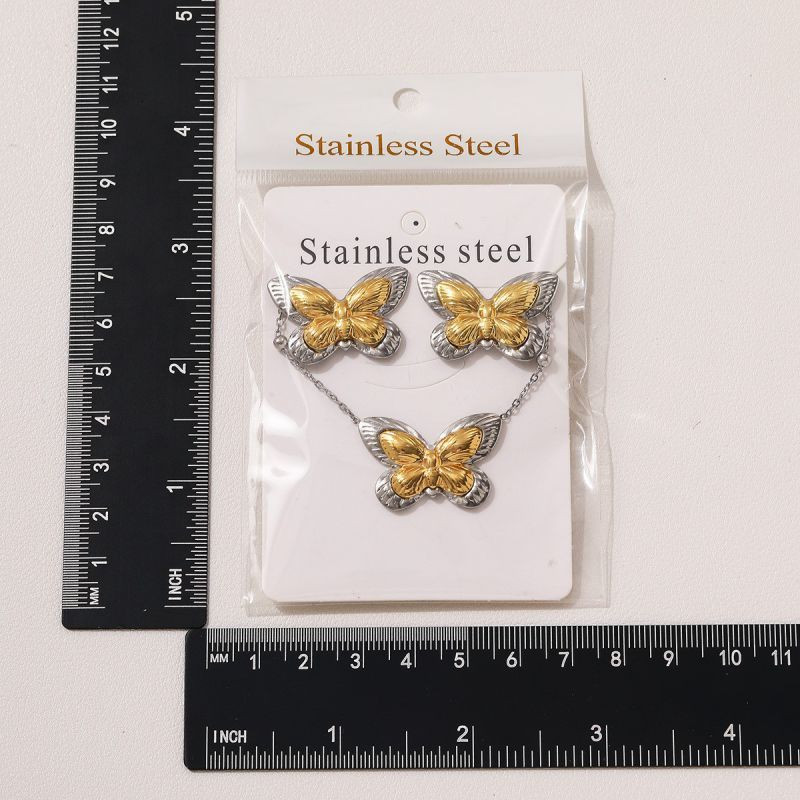 Серебряно-золотое колье из титановой стали с бабочкой и сердцем ASUZ56502