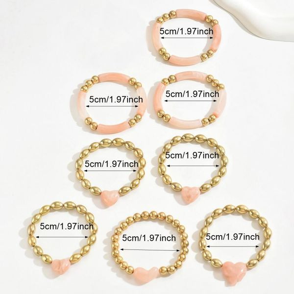 Комплект браслетов с розовыми сердцами и золотистыми деталями CJK23254