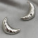 Серьги-гвоздики полумесяц 1J12116CJJ
