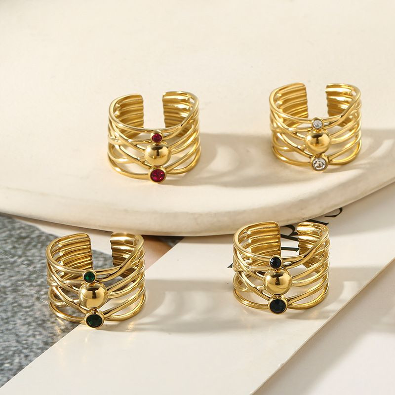 Широкое разомкнутое кольцо с мелкими камнями CJL74330