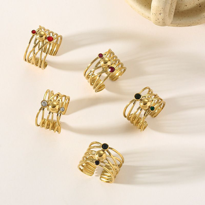 Широкое разомкнутое кольцо с мелкими камнями CJL74330