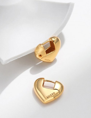 Широкие золотистые серьги-сердца Z65700 Широкие золотистые серьги-сердца Z65700