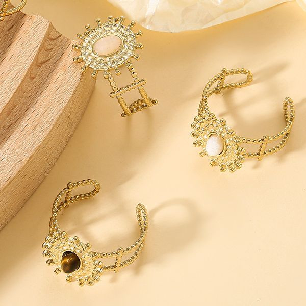 Кольцо с центральным элементом в форме солнца и жемчугом CJL47072