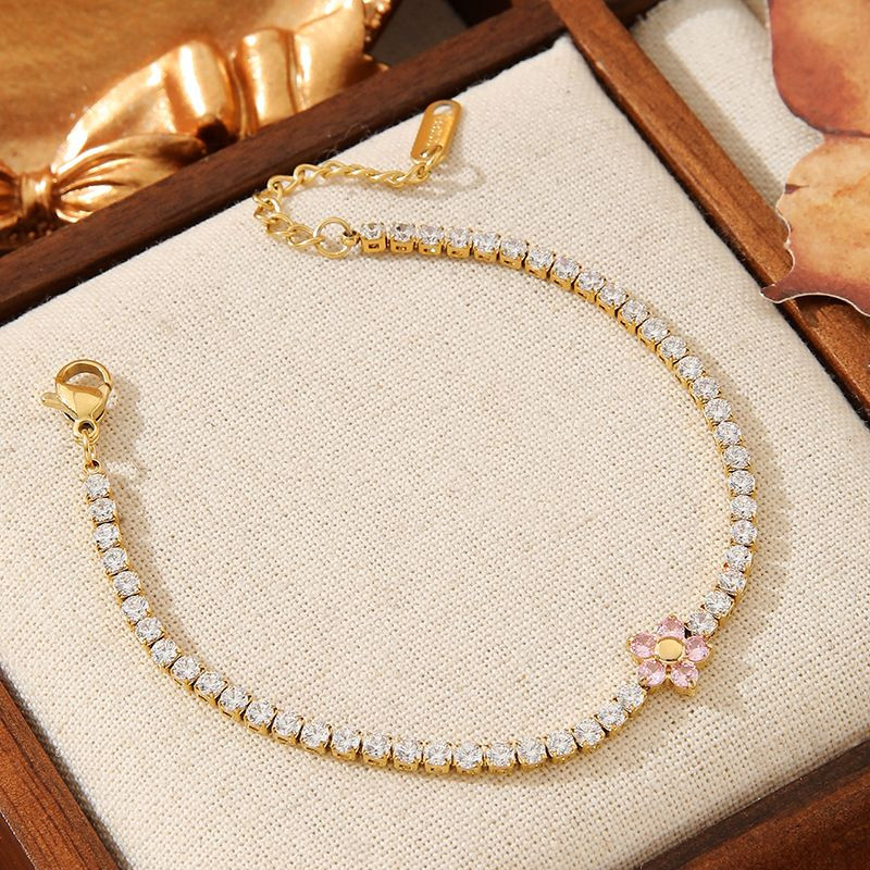 Браслет-дорожка золотистый с изящным цветком CJN91585