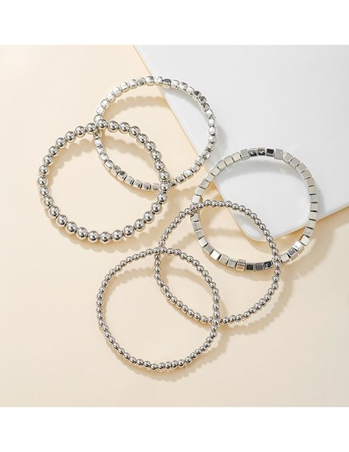 Комплект жестких браслетов золотистого цвета L74309