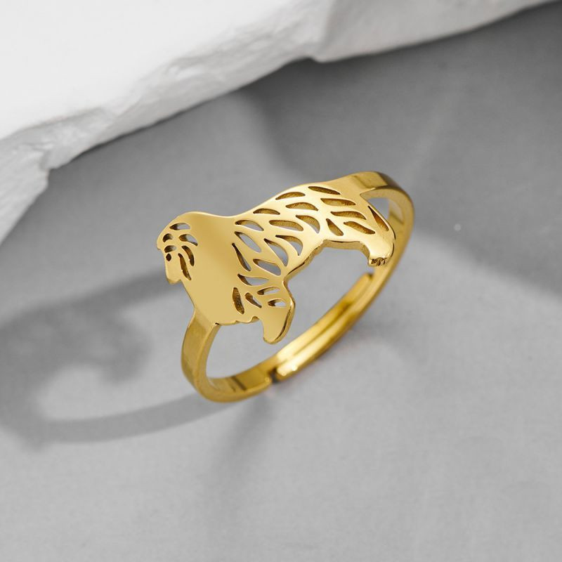 Золотистое кольцо с силуэтом льва CJH89559