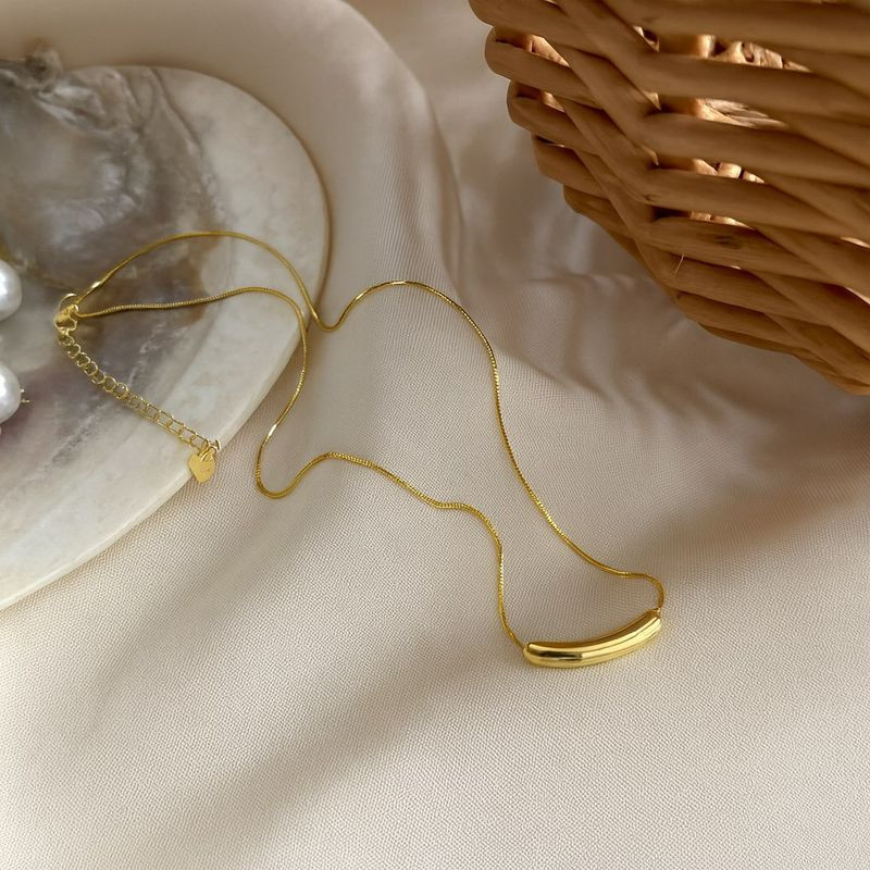 Золотистая гибкая цепочка с цилиндрической подвеской-бегунком 1J12491CJJ