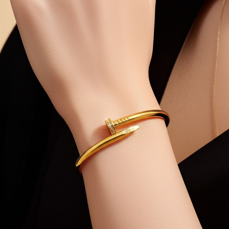 Браслет жесткий гвоздь классический золотистый 1J12043CJJ