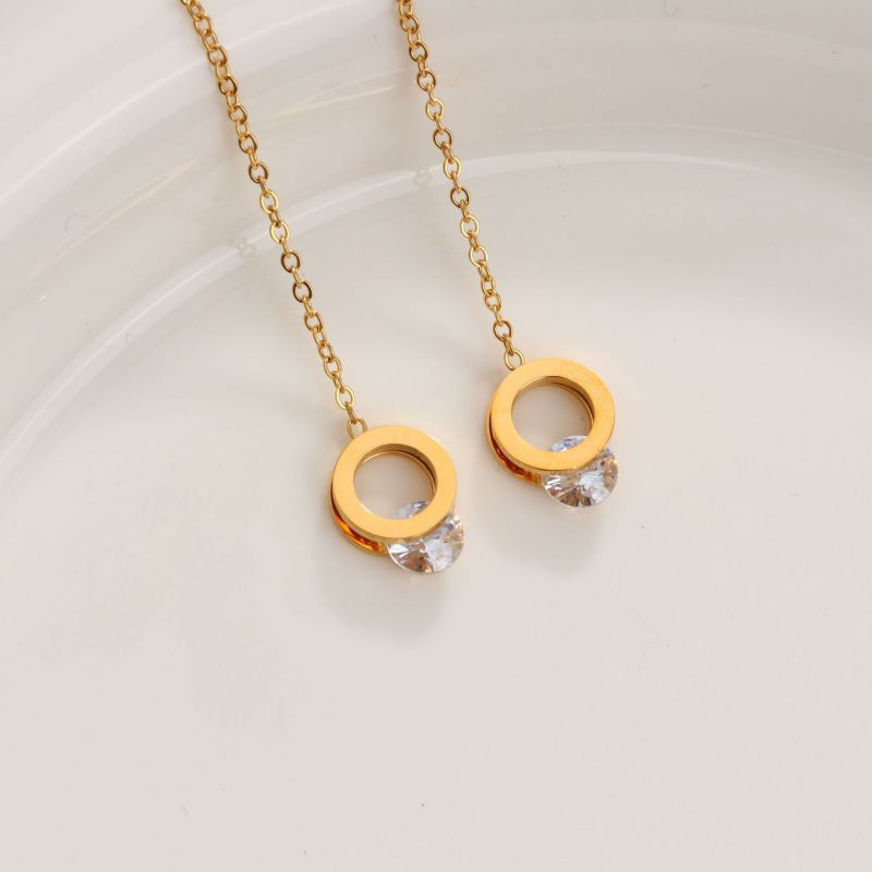 Золотистые серьги-протяжки Кольца с кристаллами CJH32665