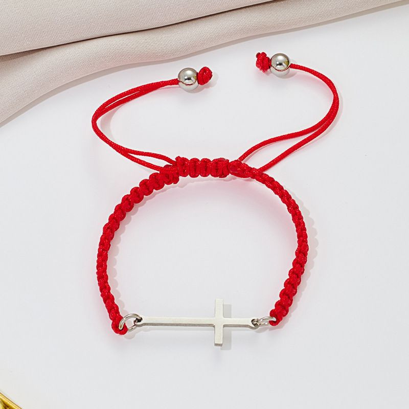 Браслет плетеная нить с длинным серебристым крестом CJQ65918