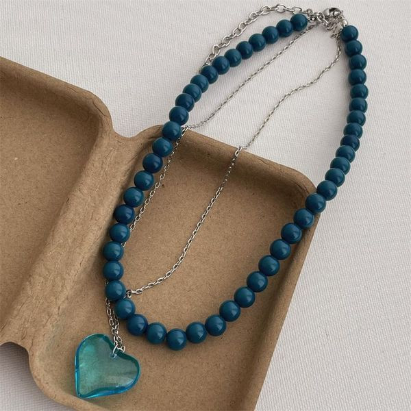 Двухслойное колье из синего бисера с серебристой подвеской CJL47500