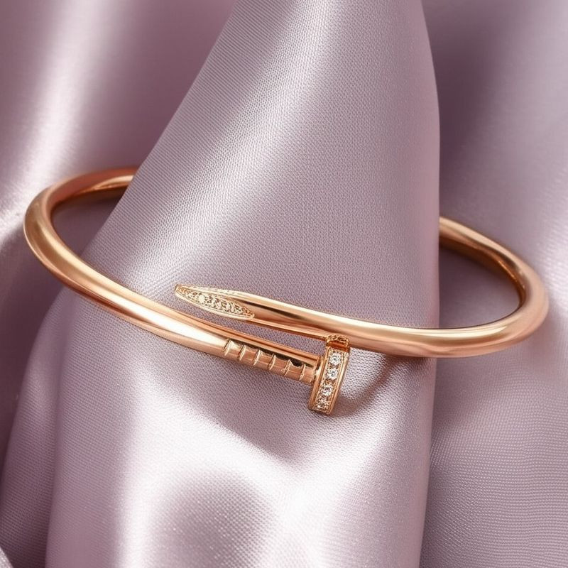 Браслет жесткий гвоздь в оттенке розовое золото 1J12045CJJ