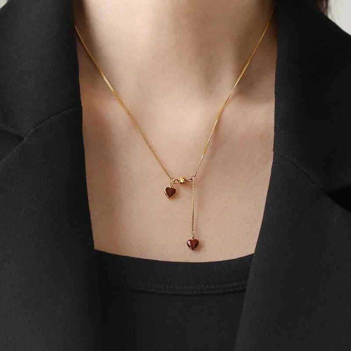 Золотистое колье-галстук с кристаллами CJM85055