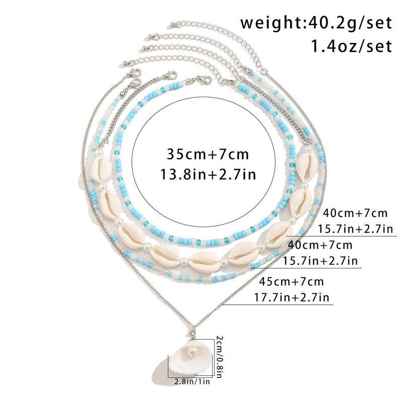 Мульти-цепочка из бисера с ракушками 1J11840CJJ Мульти-цепочка из бисера с ракушками 1J11840CJJ