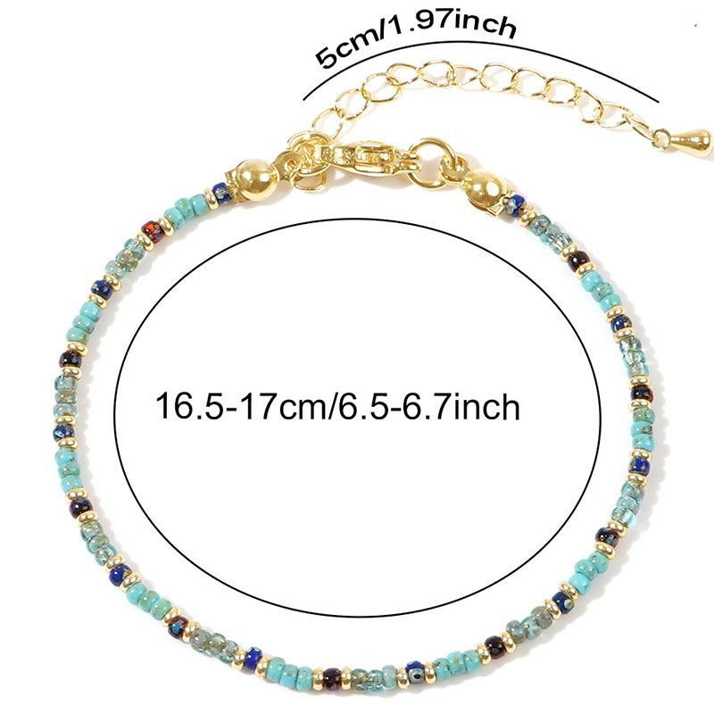 Браслет из бисера с золотистой фурнитурой CJH68065