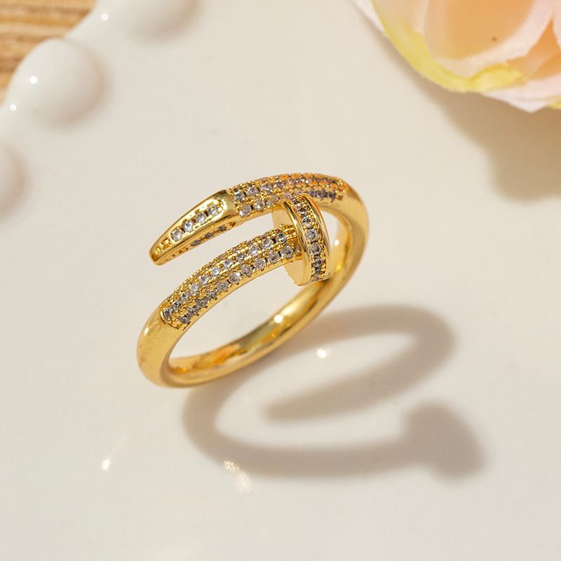 Кольцо медь с напылением золотом и фианитами гвоздь 1J11975CJJ Кольцо медь с напылением золотом и фианитами гвоздь 1J11975CJJ