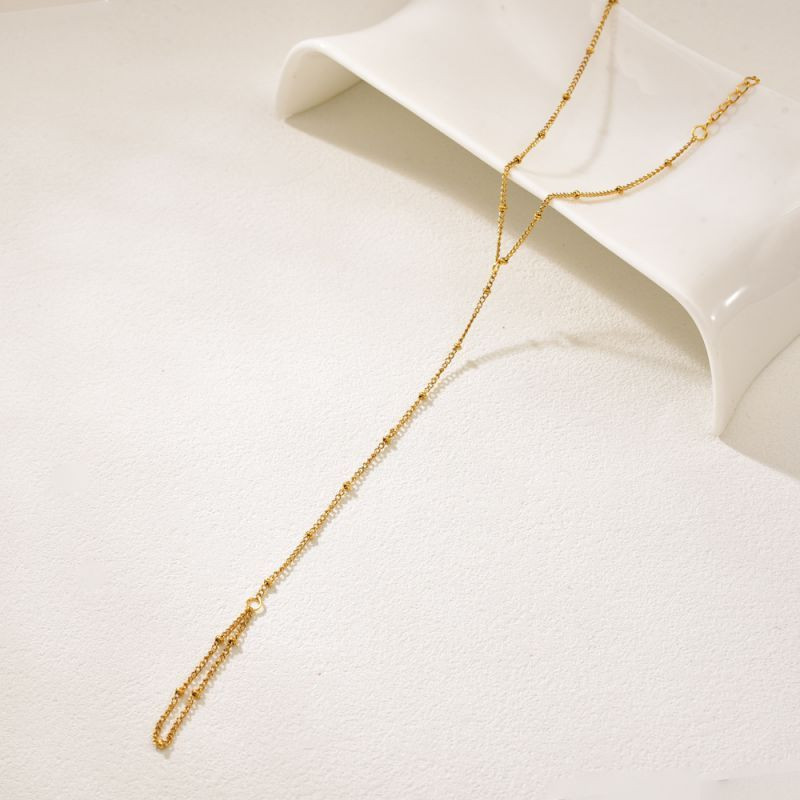 Браслет-слейв золотистый с изящной подвеской-каплей CJQ17666