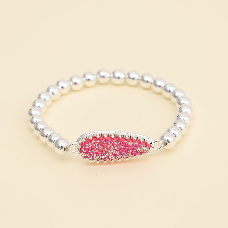 Браслет из белых бусин с розовой вставкой CJH58498