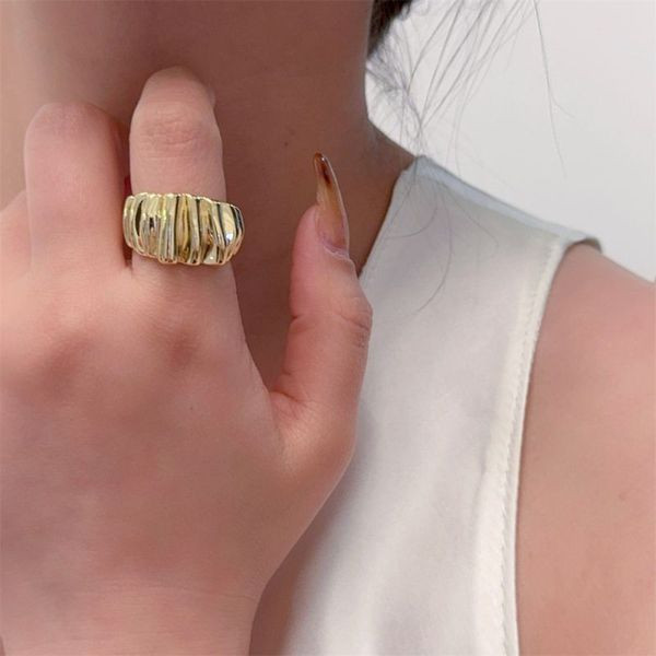 Широкое фактурное кольцо с продольными прорезями CJL47323