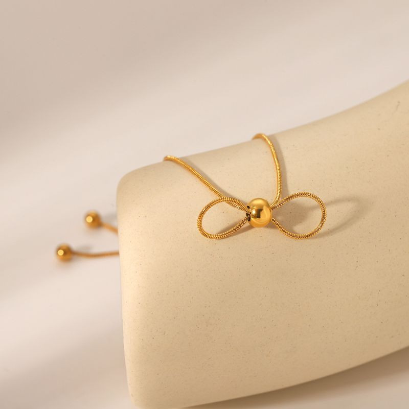 Браслет изящный с центральным элементом в форме банта CJL78792