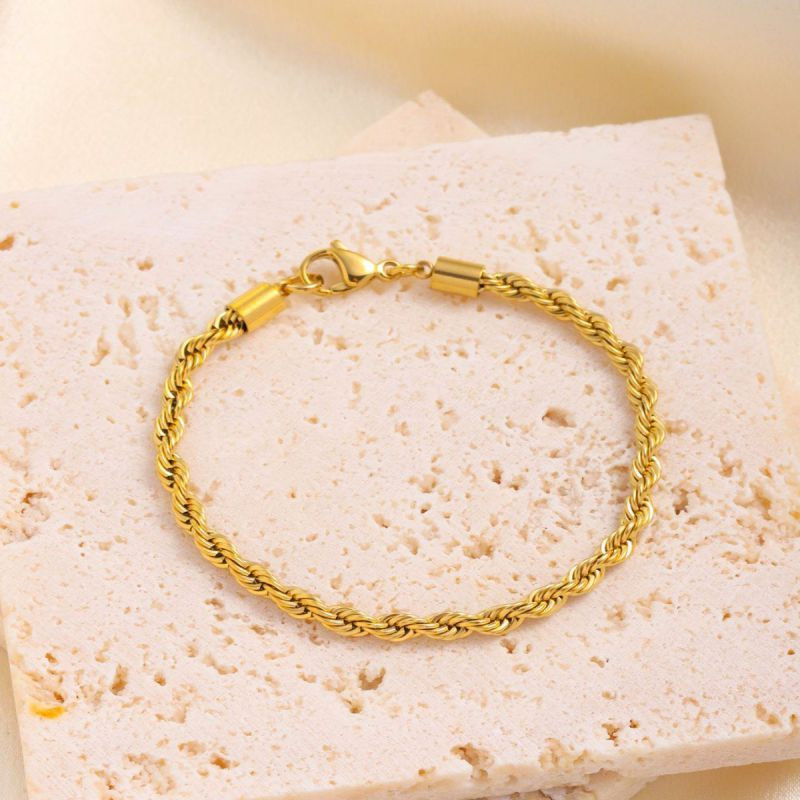 Браслет витой с фактурным плетением в золотистом цвете CJL32428