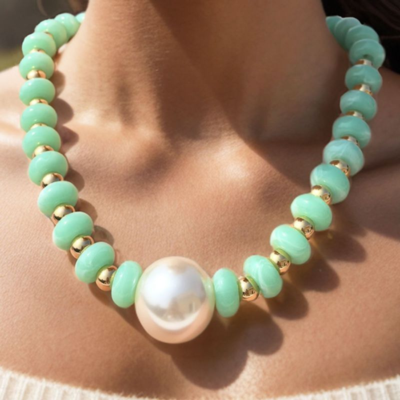 Бусы из крупного оранжевого камня с центральной жемчужиной CJN32414 Бусы из крупного оранжевого камня с центральной жемчужиной CJN32414