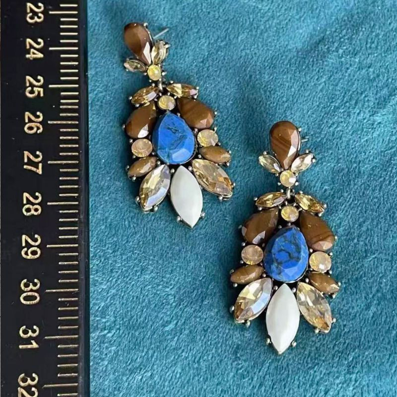 Коричневые серьги с камнем и кисточкой CJZ49580