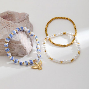 Браслет из бисера и жемчуга с золотистой подвеской CJP49635 Браслет из бисера и жемчуга с золотистой подвеской CJP49635