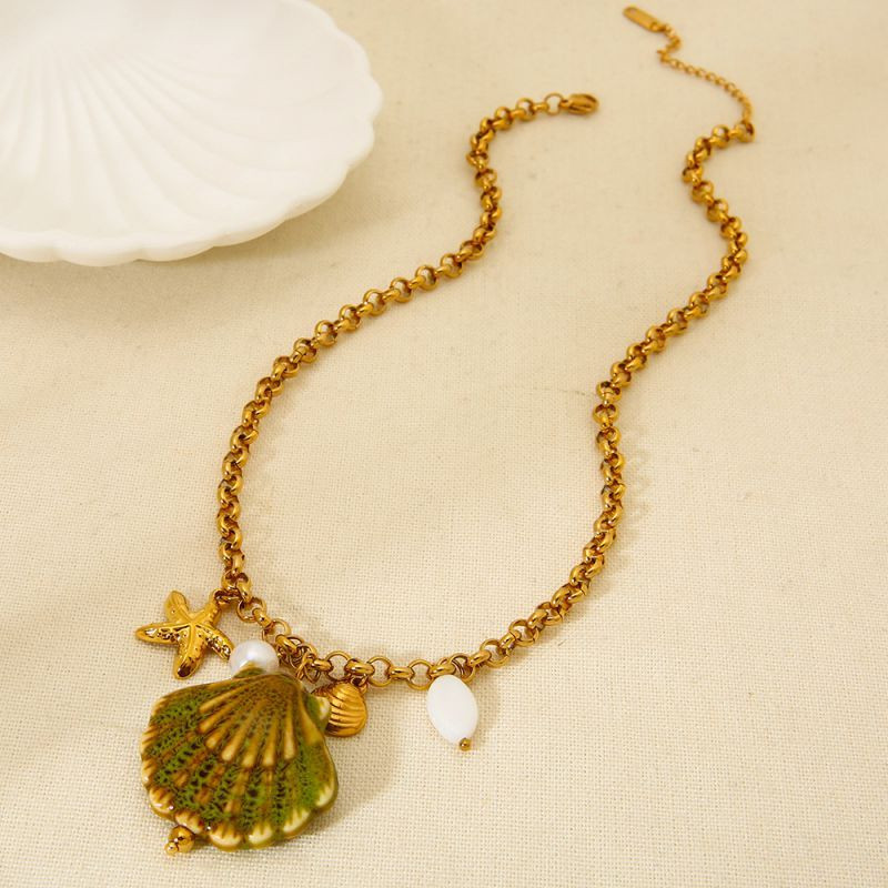 Золотистая цепочка с ракушкой и жемчугом CJP49641 Золотистая цепочка с ракушкой и жемчугом CJP49641