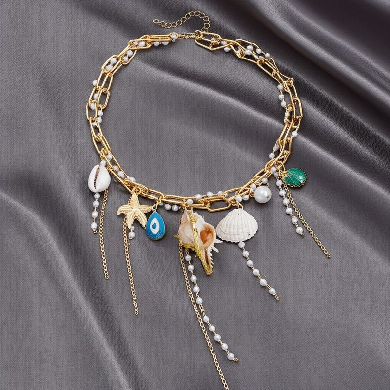 Колье ювелирный сплав с ракушками 1J11845CJJ Колье ювелирный сплав с ракушками 1J11845CJJ