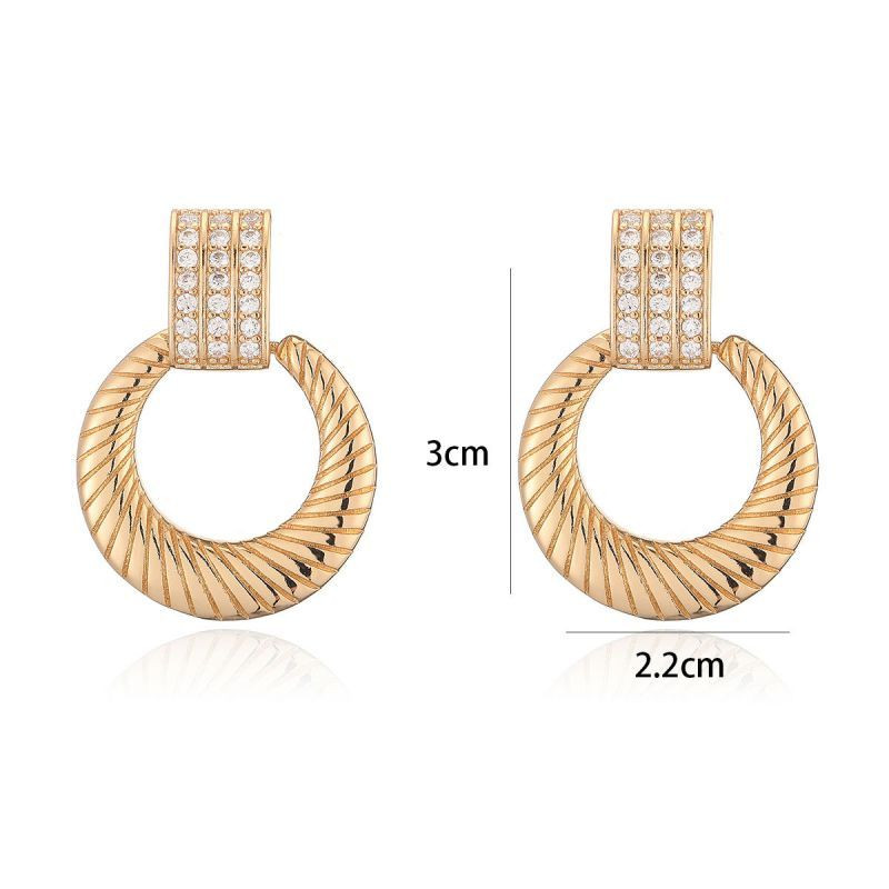 Крупные серьги-кольца с фактурным рельефом CJL20479