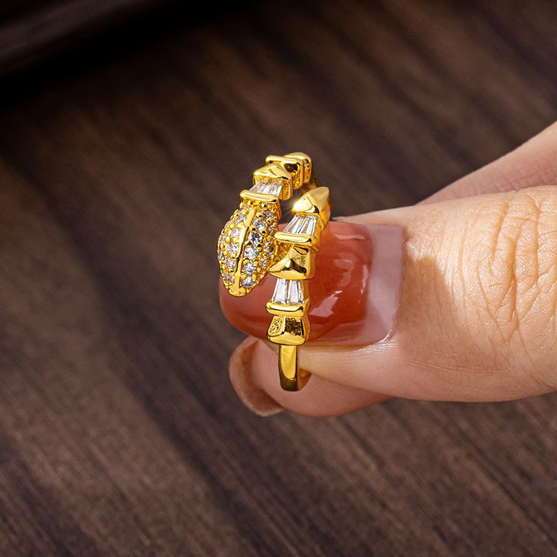 Кольцо змея с комбинированной огранкой камней 1J11980CJJ