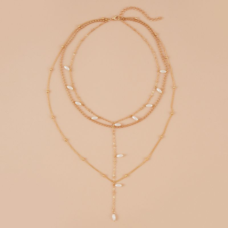 Многослойное золотистое Колье с жемчужными подвесками CJH77156 Многослойное золотистое Колье с жемчужными подвесками CJH77156