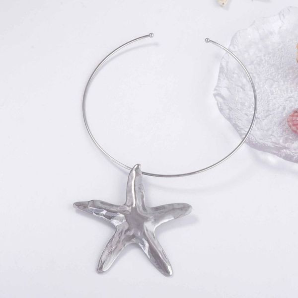 Жесткое колье золотистое с крупной морской звездой CJL69494