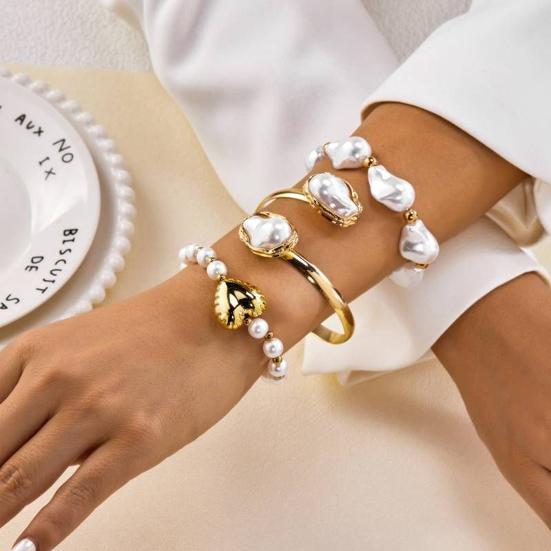 Комплект жестких браслетов с барочным жемчугом CJT06807 Комплект жестких браслетов с барочным жемчугом CJT06807