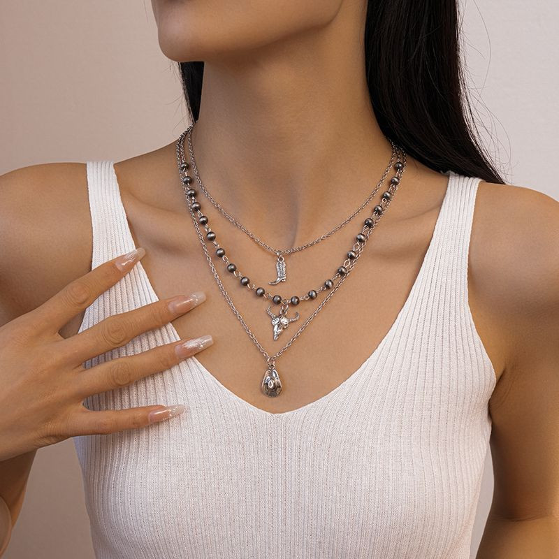 Многослойная цепочка из сплава с этническими подвесками 1J11846CJJ