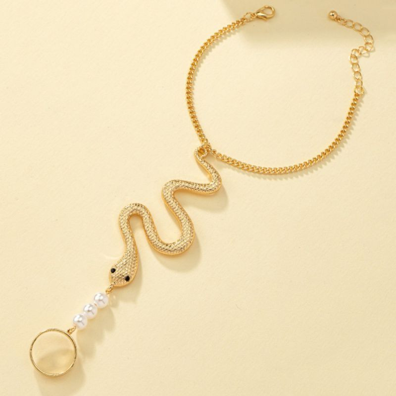 Слейв-браслет золотая змея с мерцающими глазами CJF88025