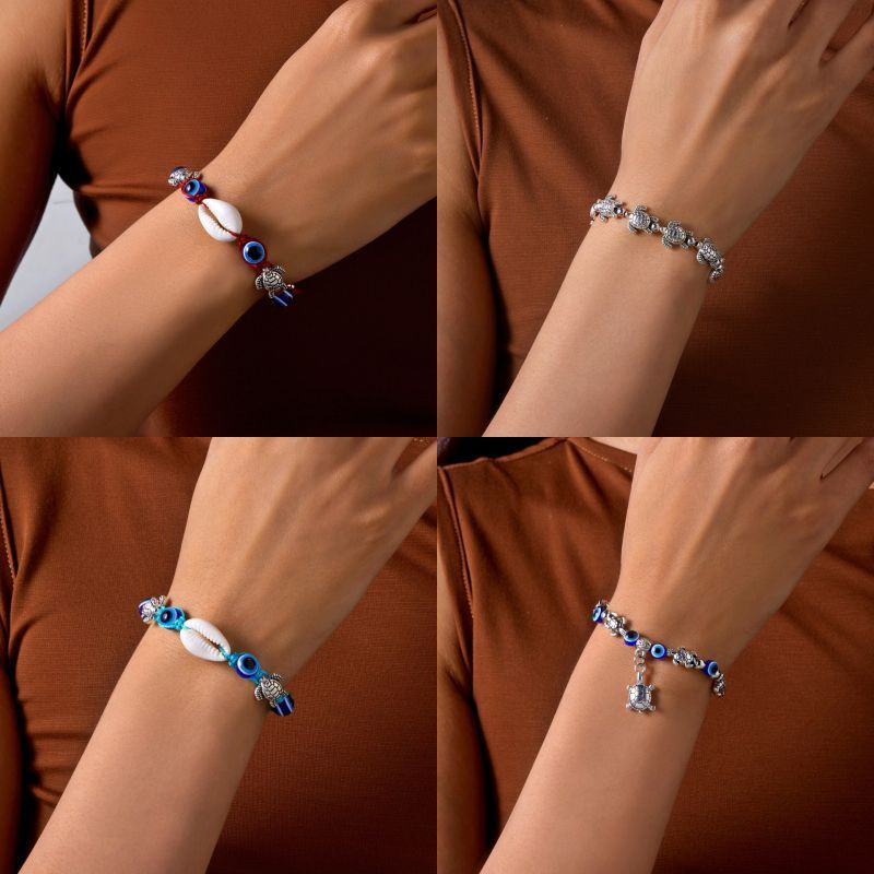 Браслет из синих бусин с ракушкой CJT11315