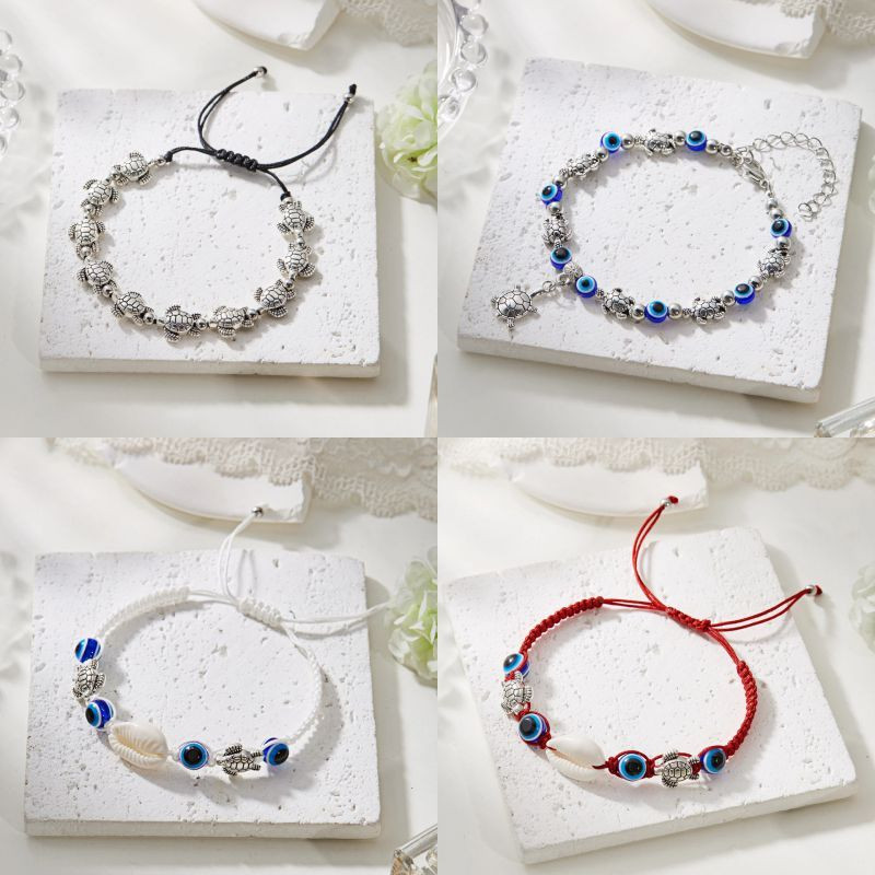 Браслет из синих бусин с ракушкой CJT11315